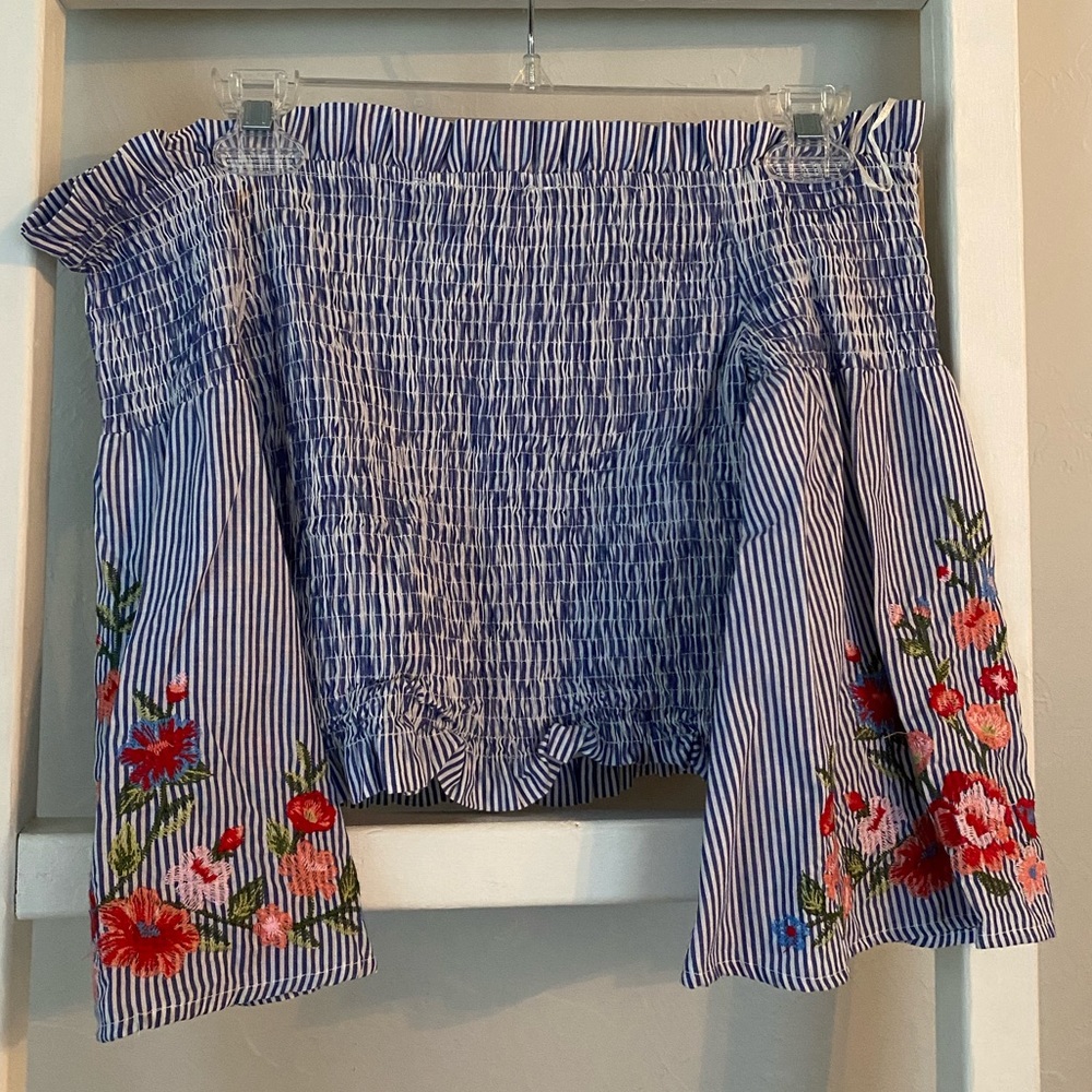 Smocked off the shoulder crop top with bell sleeve